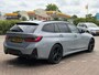 BMW 3-Serie 320e Touring M-SPORT | PANORAMADAK| LEDER SPORT INTERIEUR| HEAD-UP DISPLAY| BORDENHERKENNING| DODE HOEK DETECTIE| HERMANKARDON | AIROC/ECC | CRUISECONTROLL | CAMERA | PARKEERSENSOREN |