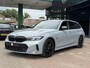 BMW 3-Serie 320e Touring M-SPORT | PANORAMADAK| LEDER SPORT INTERIEUR| HEAD-UP DISPLAY| BORDENHERKENNING| DODE HOEK DETECTIE| HERMANKARDON | AIROC/ECC | CRUISECONTROLL | CAMERA | PARKEERSENSOREN |