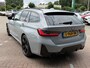 BMW 3-Serie 320e Touring M-SPORT | PANORAMADAK| LEDER SPORT INTERIEUR| HEAD-UP DISPLAY| BORDENHERKENNING| DODE HOEK DETECTIE| HERMANKARDON | AIROC/ECC | CRUISECONTROLL | CAMERA | PARKEERSENSOREN |