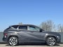 Hyundai Kona Electric Premium 65.4 kWh | Adaptieve cruisecontrol | Contrasterende dakkleur | Warmtepomp & V2L | Lederen bekleding & memory | Allseason banden |