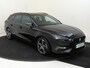 SEAT Leon Sportstourer 1.0 eTSI FR Business | Parkeersensoren achter | 3-zone airco | Cruise Control | CarPlay | Lane assist | Elektrisch inklapbare buitenspiegels |