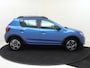 Dacia Sandero 1.0 TCe Stepway Serie Limitee 15th Anniv. Navigatie | Cruise & Climate Control | LM Velgen | Dakrails |