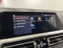 BMW 3-Serie 330e M-Sport | Tansanitblau | Schuif/kanteldak | Memory |