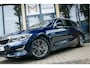 BMW 3-Serie Touring 330i Aut. | High Executive | Luxury Line | Head-Up Display | Navigatie incl. Apple CarPlay | HIFI | Achteruitrijcamera | Sportstoelen | 17" LM Velgen |