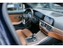 BMW 3-Serie Touring 330i Aut. | High Executive | Luxury Line | Head-Up Display | Navigatie incl. Apple CarPlay | HIFI | Achteruitrijcamera | Sportstoelen | 17" LM Velgen |