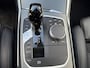 BMW 3-Serie Touring 330e M-Pakket | Shadowline | Sportstoelen | Navigatie | Alcantara/leder | Trekhaak | Camera | Virtual cockpit | Apple CarPlay | Cruise control | Lane assist | LED | DAB | Stoel&stuurverwarming | Elektrische achterklep | Volledig onderhouden