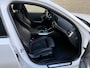 BMW 3-Serie Touring 330e M-Pakket | Shadowline | Sportstoelen | Navigatie | Alcantara/leder | Trekhaak | Camera | Virtual cockpit | Apple CarPlay | Cruise control | Lane assist | LED | DAB | Stoel&stuurverwarming | Elektrische achterklep | Volledig onderhouden