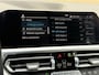 BMW 3-Serie Touring 330e M-Pakket | Shadowline | Sportstoelen | Navigatie | Alcantara/leder | Trekhaak | Camera | Virtual cockpit | Apple CarPlay | Cruise control | Lane assist | LED | DAB | Stoel&stuurverwarming | Elektrische achterklep | Volledig onderhouden