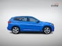 BMW X1 sDrive18i High Executive M Sport | Trekhaak Afneembaar | Sportstoelen | Navigatie Full-Map  | 18'' Velgen | Elek. Achterklep | Stoelverwarming | Rijklaarprijs!
