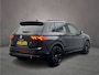 Volkswagen Tiguan 1.5 TSI R-Line Business+ 150pk DSG, Lederen bekleding, Panoramadak, Black style, Trekhaak, Stoelverwarming, Stuurverwarming, Elektrische achterklep, Adaptieve cruise control, Dynamic chassis control, Navigatie, App connect