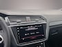 Volkswagen Tiguan 1.5 TSI R-Line Business+ 150pk DSG, Lederen bekleding, Panoramadak, Black style, Trekhaak, Stoelverwarming, Stuurverwarming, Elektrische achterklep, Adaptieve cruise control, Dynamic chassis control, Navigatie, App connect