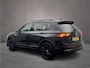 Volkswagen Tiguan 1.5 TSI R-Line Business+ 150pk DSG, Lederen bekleding, Panoramadak, Black style, Trekhaak, Stoelverwarming, Stuurverwarming, Elektrische achterklep, Adaptieve cruise control, Dynamic chassis control, Navigatie, App connect
