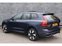 Volvo XC60 2.0 T6 Plug-in hybrid AWD Ultra Dark | Adaptive Cruise Control | Intellisafe Surround | 360 Camera | Elektr. verstelbare voorstoelen + geheugen | Stoelverwarming voor + achter | Verwarmd stuurwiel | Trekhaak | Lederen dashboard | Head-up display | Parkeersensoren voor + achter | Harman Kardon Audio | Elektr. bedienbaar schuif-\-kanteldak | Google services | Adaptieve LED koplampen |