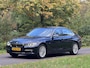 BMW 3-Serie 320i High Executive Dealer onderhouden