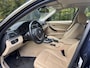 BMW 3-Serie 320i High Executive Dealer onderhouden