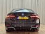 BMW i4 M50 84 kWh *M-Sport* Schuif/Kantel dak / Carbon / LASER LED / HUD / Harman Kardon / 360 Camera / Elek. Trekhaak / Org.NL!