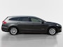 Ford Mondeo Wagon 2.0 IVCT HEV Titanium | Automaat | Navigatie | Apple carplay & Android auto | Parkeersensor voor en achter | Achteruitrijcamera | Dodehoek detectie | Stoelverwarming voor | Adaptief cruise control | Trekhaak |
