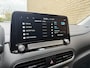 Hyundai Kona Electric EV Premium 64 kWh | 3 fase | 100% SOH | Leder | Schuif/kanteldak | Navigatie | Adaptieve cruise | Lane assist | Apple CarPlay | Stoelverwarming&koeling | Achterbankverwarming | Camera | PDC voor+achter | Head up display | Volledig onderhouden