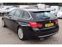 BMW 3-Serie Touring 320i Luxury Edition (NL auto), Navigatie, Lederen interieur, Cruise control, Climate control, Stoelverwarming