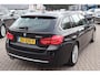 BMW 3-Serie Touring 320i Luxury Edition (NL auto), Navigatie, Lederen interieur, Cruise control, Climate control, Stoelverwarming