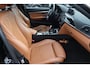 BMW 3-Serie Touring 320i Luxury Edition (NL auto), Navigatie, Lederen interieur, Cruise control, Climate control, Stoelverwarming