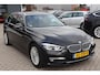 BMW 3-Serie Touring 320i Luxury Edition (NL auto), Navigatie, Lederen interieur, Cruise control, Climate control, Stoelverwarming