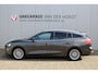 Ford Focus Wagon 1.0-125pk EcoBoost Titanium Business. Uiterst nette, comfortabele en ruime stationcar. Stoel-, stuur- en voorraamverw., Trekhaak, B&O soundsyst, lane assist, adaptieve cruise cntrl, camera a, LM wln, navigatie, telefoonvoorb. etc