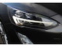Ford Focus Wagon 1.0-125pk EcoBoost Titanium Business. Uiterst nette, comfortabele en ruime stationcar. Stoel-, stuur- en voorraamverw., Trekhaak, B&O soundsyst, lane assist, adaptieve cruise cntrl, camera a, LM wln, navigatie, telefoonvoorb. etc
