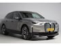 BMW iX XDrive50 | panoramadak skylounge | luchtvering | softclose | elek. trekhaak | stoelkoeling | massage stoel(en) | laser led