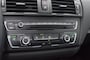BMW 1-Serie 114I 3DRS. UPGRADE ED. / NAVI / LEDER / SPORTSTOELEN / 1e EIGENAAR