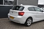 BMW 1-Serie 114I 3DRS. UPGRADE ED. / NAVI / LEDER / SPORTSTOELEN / 1e EIGENAAR