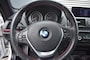 BMW 1-Serie 114I 3DRS. UPGRADE ED. / NAVI / LEDER / SPORTSTOELEN / 1e EIGENAAR