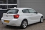BMW 1-Serie 114I 3DRS. UPGRADE ED. / NAVI / LEDER / SPORTSTOELEN / 1e EIGENAAR