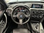 BMW 3-Serie Touring 320i Centennial High Executive Panoramadak | Cruise control | Parkeersensoren voor en achter | Lichtmetalen velgen 19" |