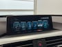 BMW 3-Serie Touring 320i Centennial High Executive Panoramadak | Cruise control | Parkeersensoren voor en achter | Lichtmetalen velgen 19" |