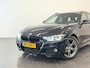 BMW 3-Serie Touring 320i Centennial High Executive Panoramadak | Cruise control | Parkeersensoren voor en achter | Lichtmetalen velgen 19" |