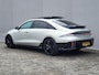 Hyundai Ioniq 6 First Edition AWD 77.4 kWh Automaat / 100% SOH / Origineel NL Auto / tot 04-2009 Fabrieksgarantie / Allseason banden / Schuifkanteldak / 360° camera / Navigatie / Headup Display / Android Auto / Apple Carplay / BOSE audio / Stuur-, voorstoel- en achterbankverwarming /