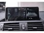 BMW 1-Serie 114i EDE Business+ Navi Leder 18 Inch Cruise kleppen uitlaat PDC achter stoelverwarming voor private-glas