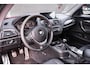 BMW 1-Serie 114i EDE Business+ Navi Leder 18 Inch Cruise kleppen uitlaat PDC achter stoelverwarming voor private-glas