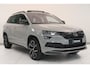 Skoda Karoq 1.5 TSI ACT Sportline Business | Adaptieve cruisecontrol | Camera | Panoramadak | Trekhaak | CANTON audio | Elektr achterklep | Stuur en stoel verwarming |