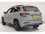 Skoda Karoq 1.5 TSI ACT Sportline Business | Adaptieve cruisecontrol | Camera | Panoramadak | Trekhaak | CANTON audio | Elektr achterklep | Stuur en stoel verwarming |