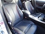 BMW 1-Serie 116i Upgrade Edition AUTOMAAT | PANORAMDAK | CRUISE CONTROL | NAVIGATIE | LEDER SPORT INTERIEUR | XENON - LED | PARKEERSENSOREN |AIRCO/ECC