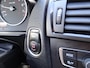 BMW 1-Serie 116i Upgrade Edition AUTOMAAT | PANORAMDAK | CRUISE CONTROL | NAVIGATIE | LEDER SPORT INTERIEUR | XENON - LED | PARKEERSENSOREN |AIRCO/ECC