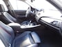 BMW 1-Serie 116i Upgrade Edition AUTOMAAT | PANORAMDAK | CRUISE CONTROL | NAVIGATIE | LEDER SPORT INTERIEUR | XENON - LED | PARKEERSENSOREN |AIRCO/ECC