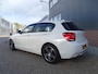 BMW 1-Serie 116i Upgrade Edition AUTOMAAT | PANORAMDAK | CRUISE CONTROL | NAVIGATIE | LEDER SPORT INTERIEUR | XENON - LED | PARKEERSENSOREN |AIRCO/ECC
