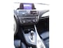 BMW 1-Serie 116i Upgrade Edition AUTOMAAT | PANORAMDAK | CRUISE CONTROL | NAVIGATIE | LEDER SPORT INTERIEUR | XENON - LED | PARKEERSENSOREN |AIRCO/ECC