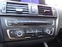 BMW 1-Serie 116i Upgrade Edition AUTOMAAT | PANORAMDAK | CRUISE CONTROL | NAVIGATIE | LEDER SPORT INTERIEUR | XENON - LED | PARKEERSENSOREN |AIRCO/ECC