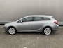 Opel Astra Sports Tourer 1.4 Turbo Cosmo 126Dkm.NAP, AUTOMAAT, Leer/Stof, Navi, CC, PDC, LM, Afn.Trekh, nw. APK – Inruil Mogelijk –
