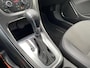 Opel Astra Sports Tourer 1.4 Turbo Cosmo 126Dkm.NAP, AUTOMAAT, Leer/Stof, Navi, CC, PDC, LM, Afn.Trekh, nw. APK – Inruil Mogelijk –