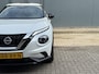 Nissan Juke 1.0 DIG-T N-Connecta DCT Automaat / Trekgewicht 1.250 kg / Cold pack / Stuur-, Stoel en voorruitverwarming / Navigatie / Apple Carplay Android Auto / Achteruitrijcamera / Climate control / 17" LM wielen